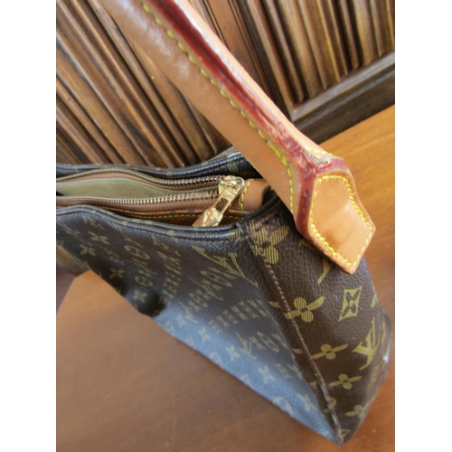 913 - Louis Vuitton Leather Handbag