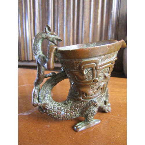 931 - Eastern Bronze Table Sensor with Mythical Beast Motif Support Approximately 4 Inches High