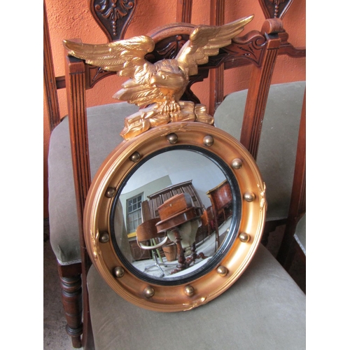 2062 - Gilded Convex Mirror with Upper Eagle Surmount Approximately 20 Inches High x 16 Inches Wide