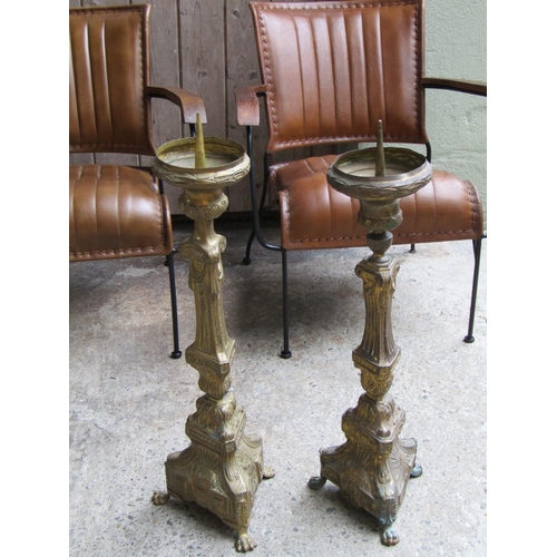 2067 - Pair of Church Candle Rests Brass Pedestal Form each Approximately 28 Inches High