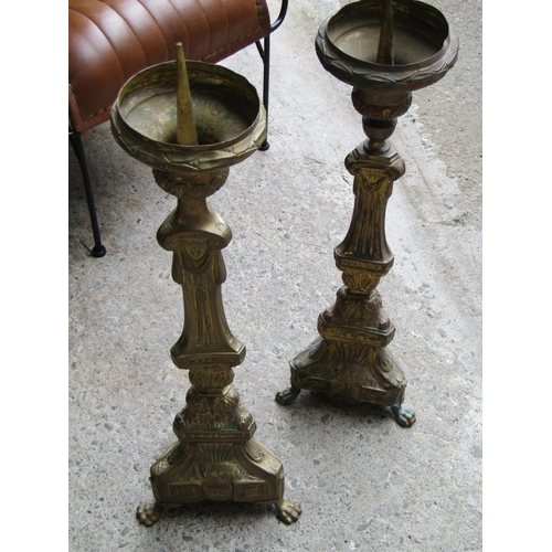 2067 - Pair of Church Candle Rests Brass Pedestal Form each Approximately 28 Inches High