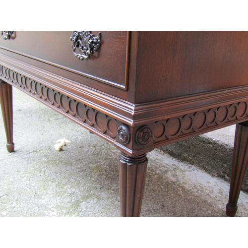 2070 - Twin Drawer Mahogany Side Chest Crossbanded Top above Tapering Reeded Supports Approximately 32 Inch... 