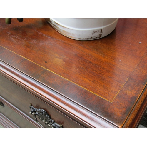 2070 - Twin Drawer Mahogany Side Chest Crossbanded Top above Tapering Reeded Supports Approximately 32 Inch... 