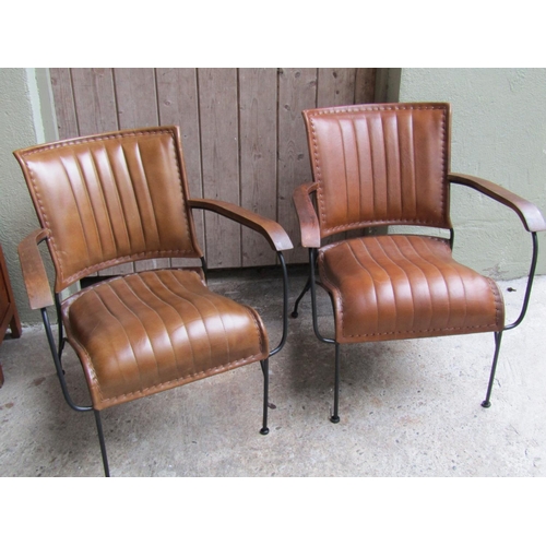 2074 - Pair of Designer Tan Leather Armchairs Wrought Iron Frames Wooden Panel Armrests Good Construction