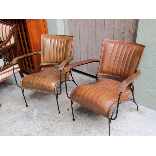 2074 - Pair of Designer Tan Leather Armchairs Wrought Iron Frames Wooden Panel Armrests Good Construction