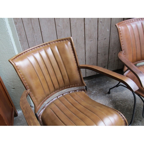 2074 - Pair of Designer Tan Leather Armchairs Wrought Iron Frames Wooden Panel Armrests Good Construction