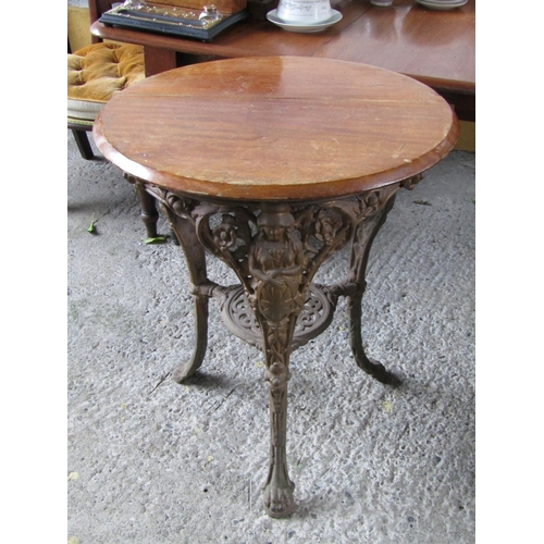 2080 - Cast Iron Circular Form Bar Table with Mahogany Top Approximately 20 Inches Diameter x 30 Inches Hig... 