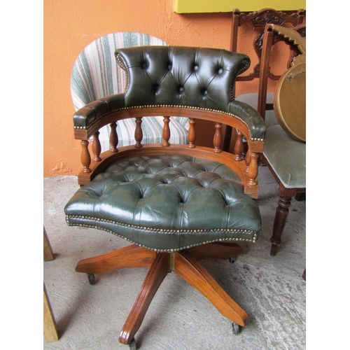 2081 - Green Leather Upholstered Captain's Desk Armchair Galleried Rail Decoration above Swivel Base