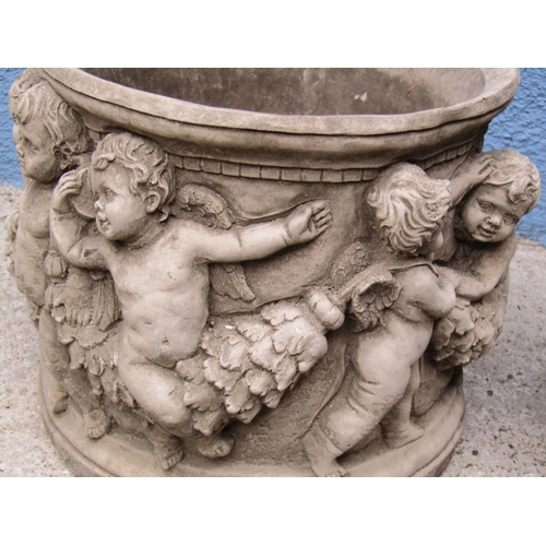 2091 - Composite Stone Pair of Circular Planters with Cherub Motif Decoration Each Approximately 12 Inches ... 