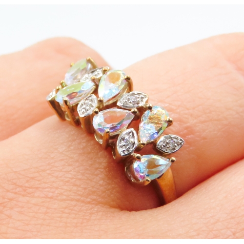 100 - Six Stone Pear Cut Chameleon Gemstone Set Ring with Further Diamond Inset Mounted in 9 Carat Yello G... 