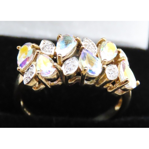 100 - Six Stone Pear Cut Chameleon Gemstone Set Ring with Further Diamond Inset Mounted in 9 Carat Yello G... 