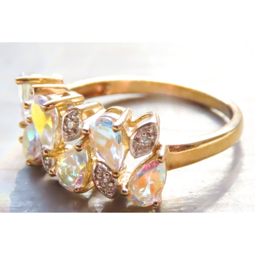 100 - Six Stone Pear Cut Chameleon Gemstone Set Ring with Further Diamond Inset Mounted in 9 Carat Yello G... 