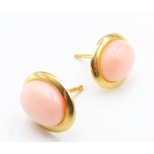 102 - Pair of Coral Set Oval Form Earrings Mounted in 18 Carat Yellow Gold 1cm High