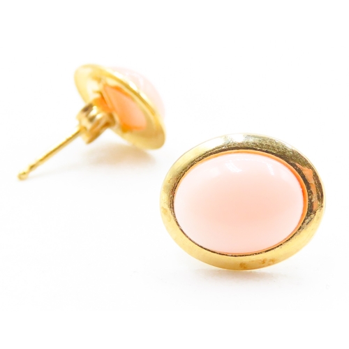 102 - Pair of Coral Set Oval Form Earrings Mounted in 18 Carat Yellow Gold 1cm High