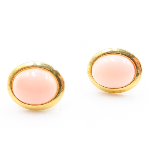 102 - Pair of Coral Set Oval Form Earrings Mounted in 18 Carat Yellow Gold 1cm High