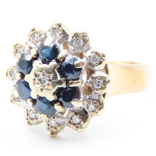 111 - Sapphire and Diamond Set Ladies Cluster Ring Mounted in 9 Carat Yellow Gold Ring Size N