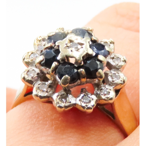 111 - Sapphire and Diamond Set Ladies Cluster Ring Mounted in 9 Carat Yellow Gold Ring Size N