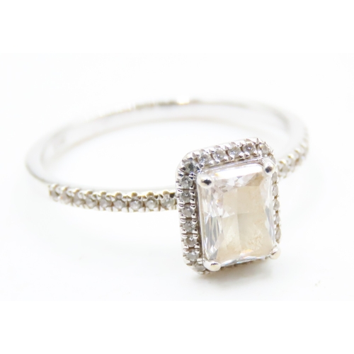 113 - Emerald Cut Gemstone Set Halo Surround Ring with Further Gemstones set to Shoulders Mounted in 10 Ca... 