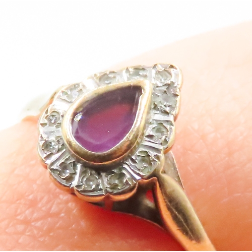 115 - Pear Cut Amethyst Bezel Set Ring with Diamond Set Surround Mounted in 9 Carat Yellow Gold Ring Size ... 