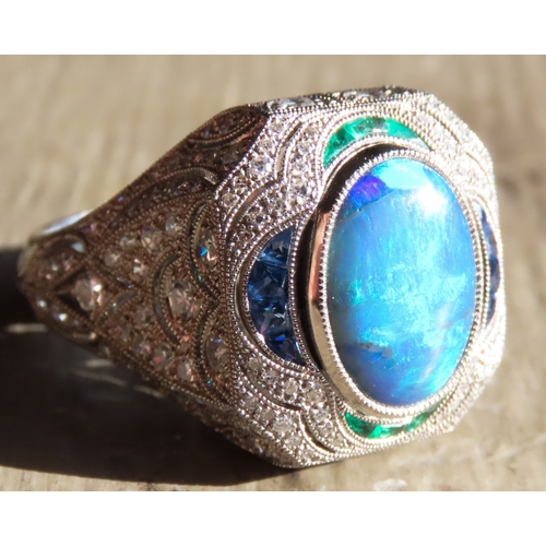 12 - Opal Centre Stone Cluster Ring Finely Detailed Set with Emerald Tanzanite and Diamonds Mounted in Pl... 