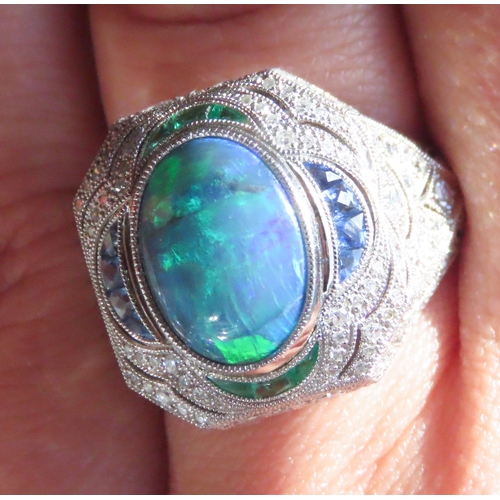 12 - Opal Centre Stone Cluster Ring Finely Detailed Set with Emerald Tanzanite and Diamonds Mounted in Pl... 