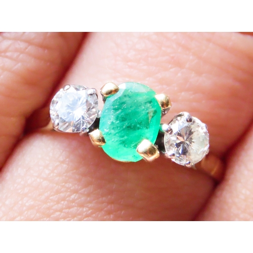 121 - Emerald and Diamond Set Three Stone Ring Four Claw Set Mounted in 18 Carat Yellow Gold Ring Size Q