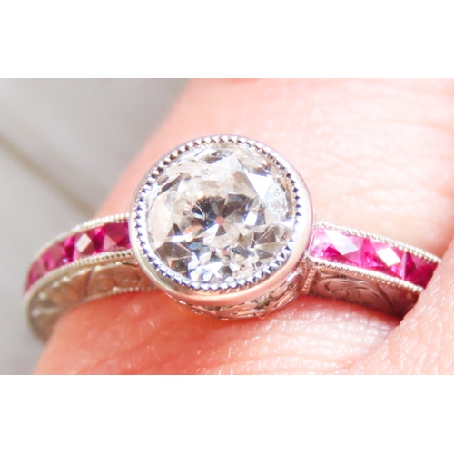 13 - Diamond Solitaire Ring Finely Detailed with Square Cut Rubies Set to Shoulders Incised Detailing Mou... 