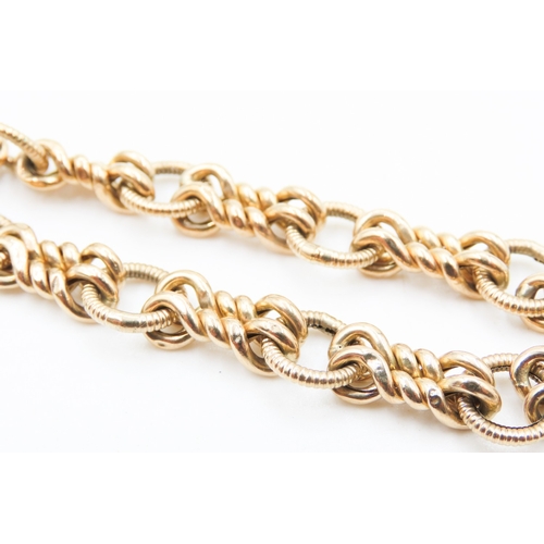 135 - 9 Carat Yellow Gold Fancy Knot Link Bracelet 22cm Long