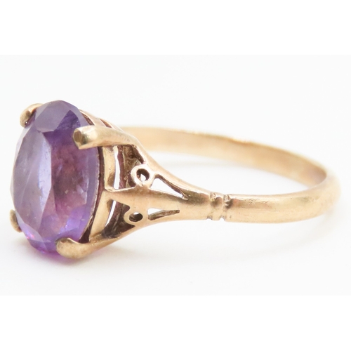 137 - Amethyst Four Claw Basket Set Single Stone Ring Mounted in 9 Carat Yellow Gold Ring Size L