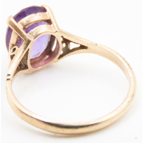 137 - Amethyst Four Claw Basket Set Single Stone Ring Mounted in 9 Carat Yellow Gold Ring Size L