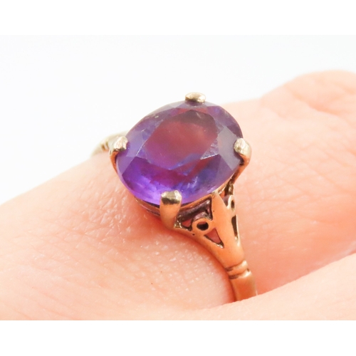 137 - Amethyst Four Claw Basket Set Single Stone Ring Mounted in 9 Carat Yellow Gold Ring Size L