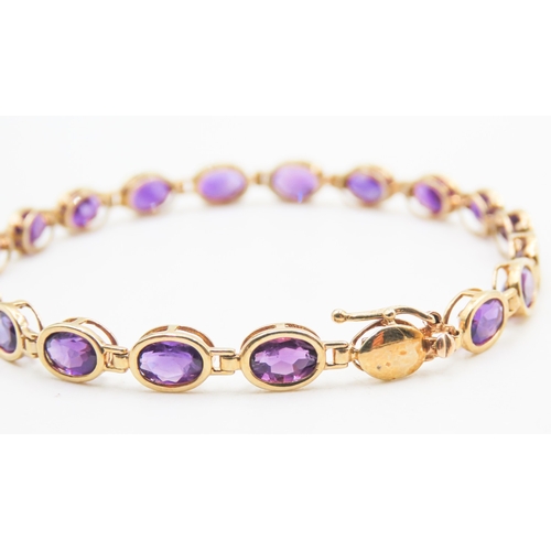 147 - Amethyst Bezel Set Nineteen Stone Bracelet Mounted in 9 Carat Yellow Gold 18.5cm Long