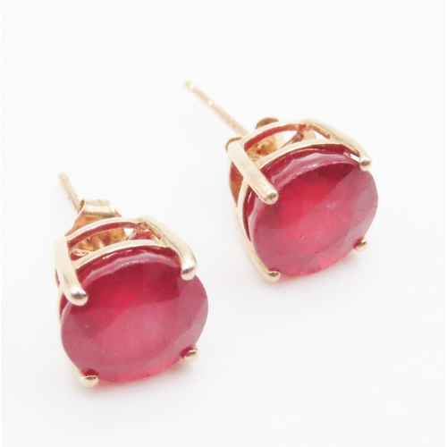 17 - Pair of Ruby Four Claw Basket Set Earrings Mounted on 10 Carat Yellow Gold Rubies 9mm Diameter