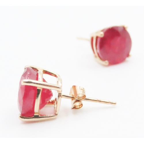 17 - Pair of Ruby Four Claw Basket Set Earrings Mounted on 10 Carat Yellow Gold Rubies 9mm Diameter