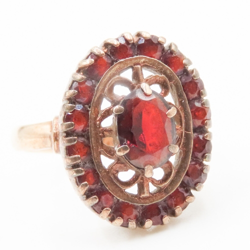 21 - Attractively Detailed Red Garnet Set Filigree Motif Ring Mounted in 9 Carat Yellow Gold Ring Size J