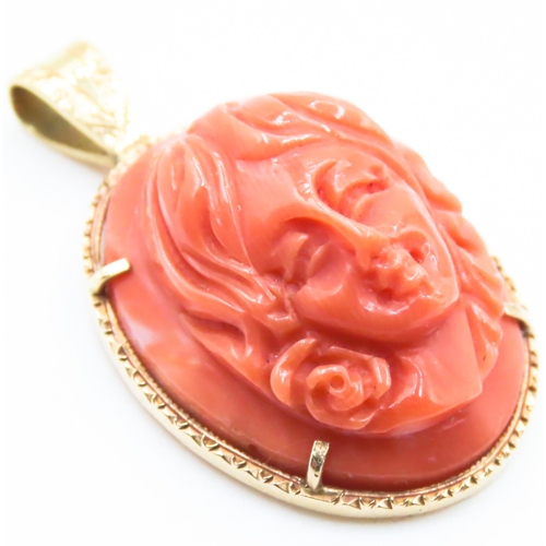 214 - 18 Carat Yellow Gold Mounted Pendant Red Coral Carved Classical Profile 3cm High Further Set on 9 Ca... 