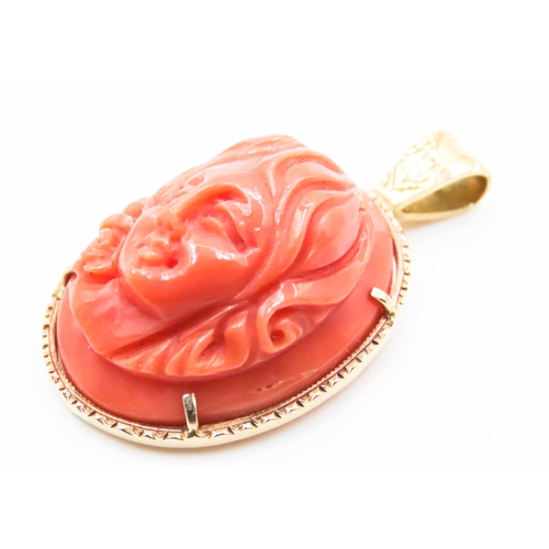 214 - 18 Carat Yellow Gold Mounted Pendant Red Coral Carved Classical Profile 3cm High Further Set on 9 Ca... 