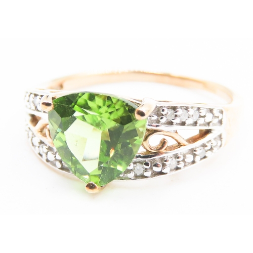 223 - Triangle Cut Peridot Centre Stone Ring with Diamonds Set to Shoulders Mounted in 9 Carat Yellow Gold... 