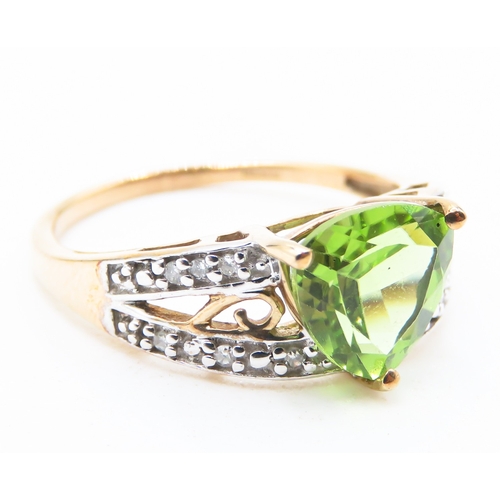 223 - Triangle Cut Peridot Centre Stone Ring with Diamonds Set to Shoulders Mounted in 9 Carat Yellow Gold... 