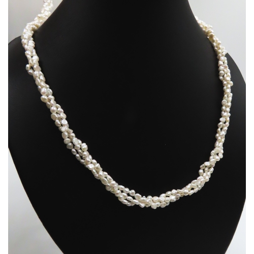 225 - Ladies Twist Form Fresh Water Seed Pearl Necklace 56cm Long