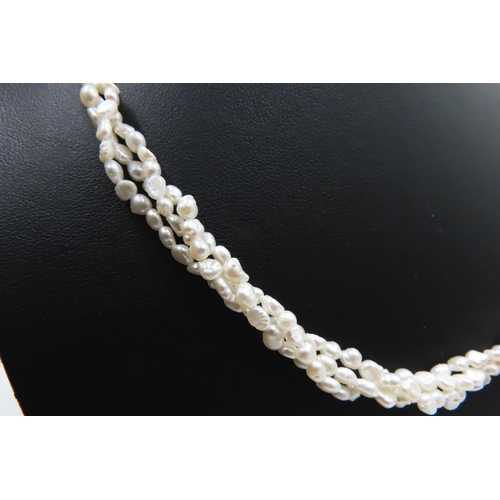 225 - Ladies Twist Form Fresh Water Seed Pearl Necklace 56cm Long