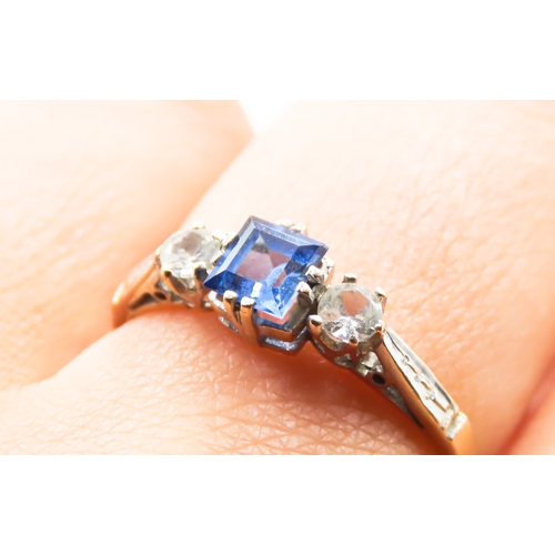 233 - Square Cut Tanzanite and Gemstone Set Three Stone Ring Mounted on 9 Carat Yellow Gold Ring Size T