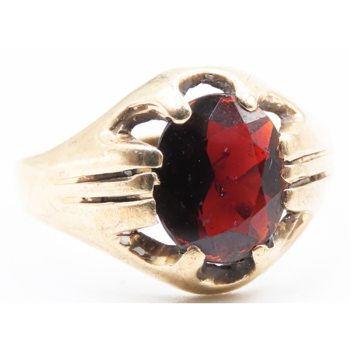 235 - Oval Cut Red Garnet Belcher Set Single Stone Ring Mounted in 9 Carat Yellow Gold Ring Size Q