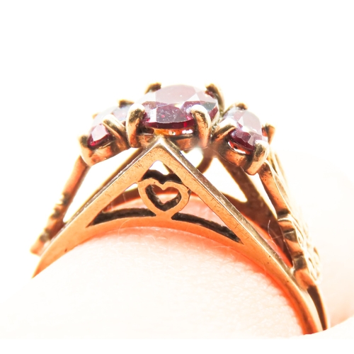 237 - Finely Detailed Red Garnet Three Stone Ring Set in 9 Carat Yellow Gold Ring Size N