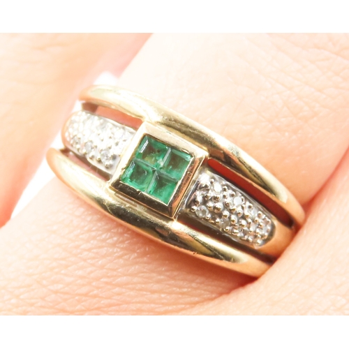 245 - Four Stone Emerald Bezel Set Ring with Diamond Insets to Shoulders Mounted in 9 Carat Yellow Gold Ri... 