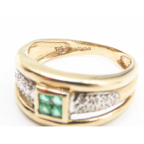 245 - Four Stone Emerald Bezel Set Ring with Diamond Insets to Shoulders Mounted in 9 Carat Yellow Gold Ri... 