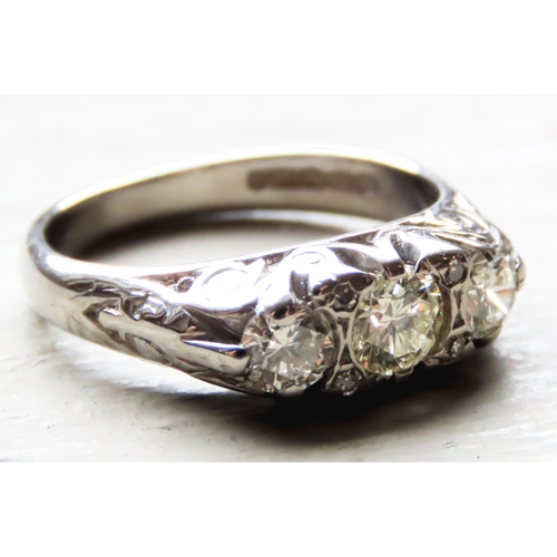 258 - Diamond Three Stone Ring Mounted in 18 Carat White Gold Incised Detail Ring Size K