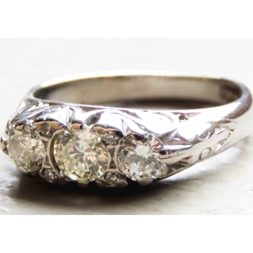 258 - Diamond Three Stone Ring Mounted in 18 Carat White Gold Incised Detail Ring Size K