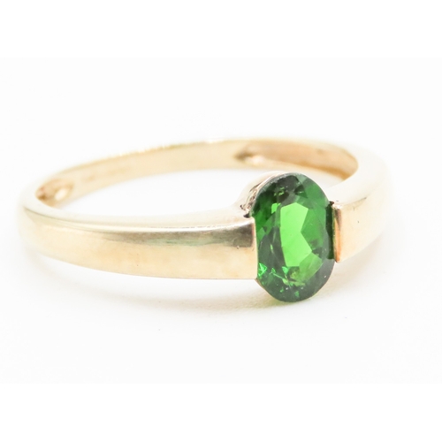 26 - Oval Cut Half Bezel Set Diopside Single Stone Ring Set in 9 Carat Yellow Gold Ring Size P