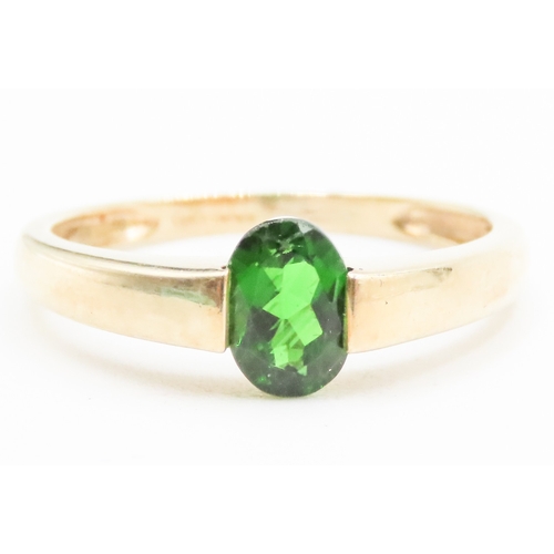 26 - Oval Cut Half Bezel Set Diopside Single Stone Ring Set in 9 Carat Yellow Gold Ring Size P